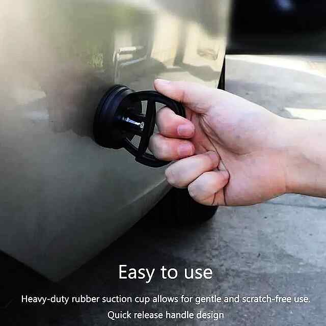 Інструмент для ремонту автомобільних вм'ятин: потужний вакуумний присосок для видалення дефектів кузова.