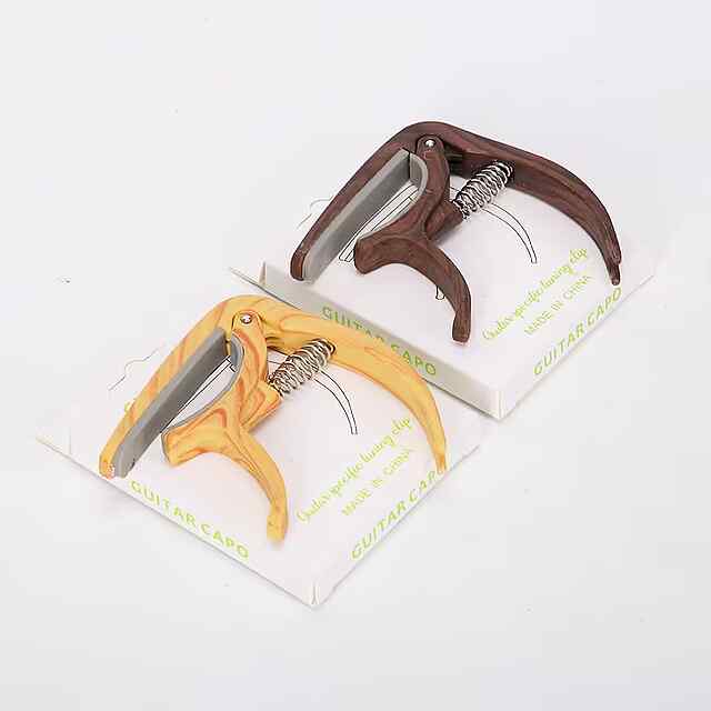 Каподастр для гітари, ABS, світле дерево. Музичний аксесуар з мішечком. - 2 фото товару