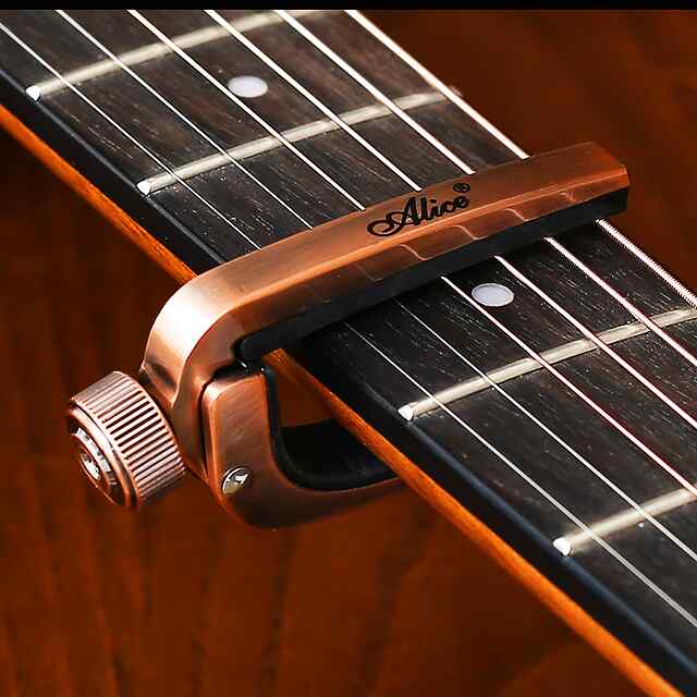 Каподастр для гітари, надійна фіксація, мішечок у комплекті