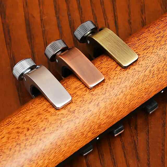 Каподастр для гітари, надійна фіксація, мішечок у комплекті - 1 фото товару