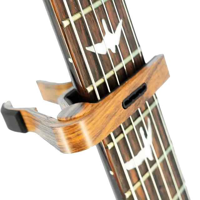 Каподастр універсальний для гітари металевий 9,5*18,5см дерево - 0 фото товару